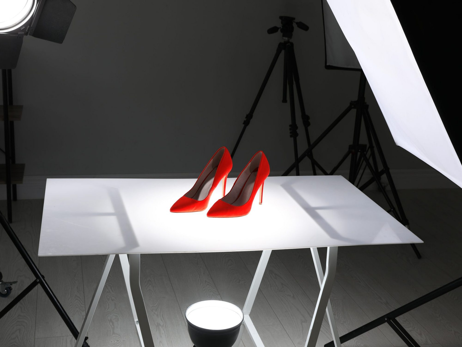 Professional photography equipment prepared for shooting stylish shoes in studio